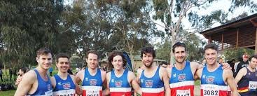 St Stephen's Harriers men's team in club singlets at a cross country meet