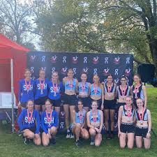 St Stephen's Harriers athletes with medals at an Athletics Victoria meet