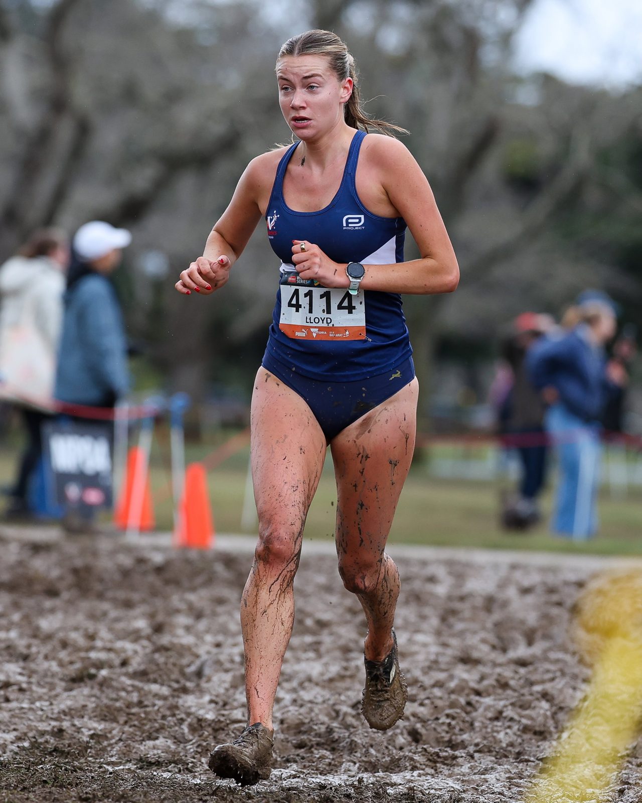 Saskia Lloyd running in Victorian colours at the national cross country championships in Ballarat