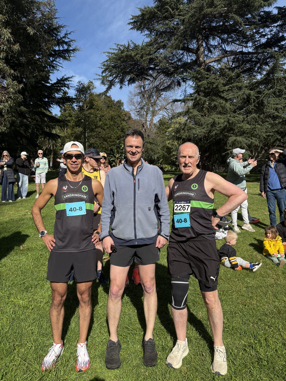Three Sandringham masters runners before their relay leg at the Tan