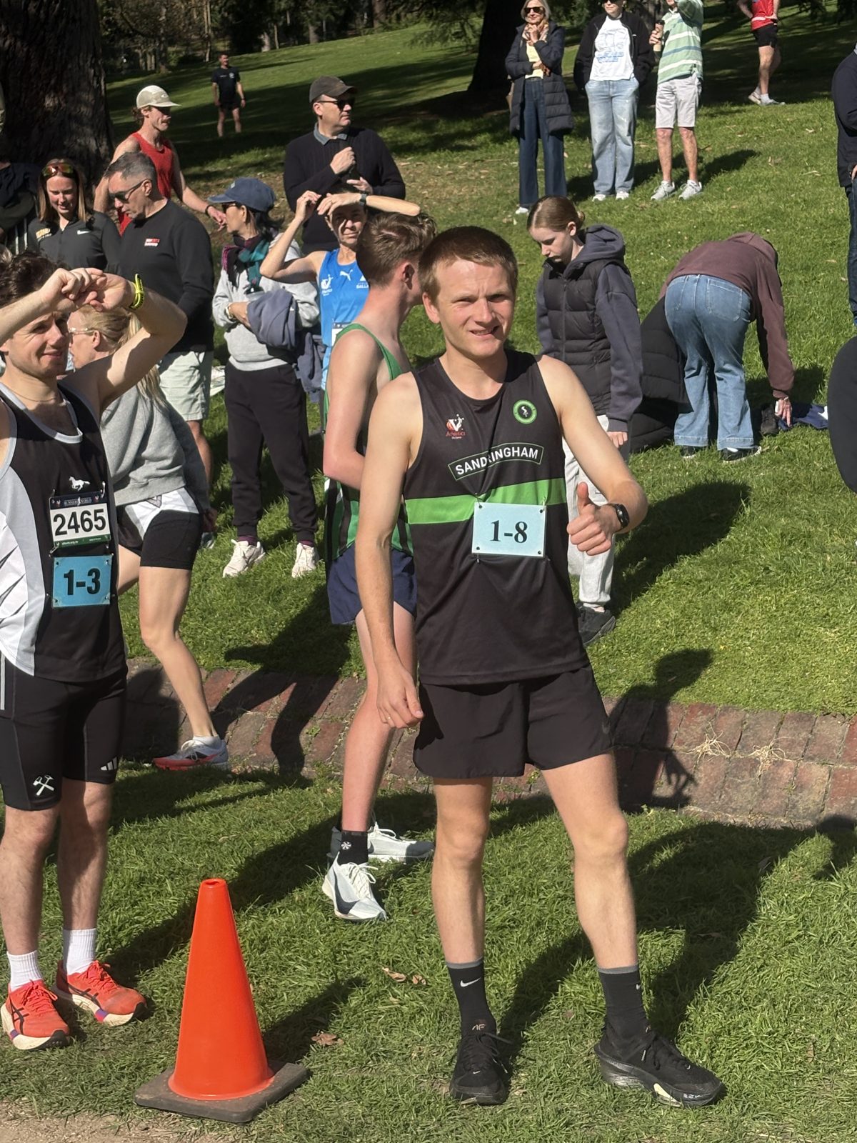 A Sandringham athlete in the changeover area waiting to run a relay leg