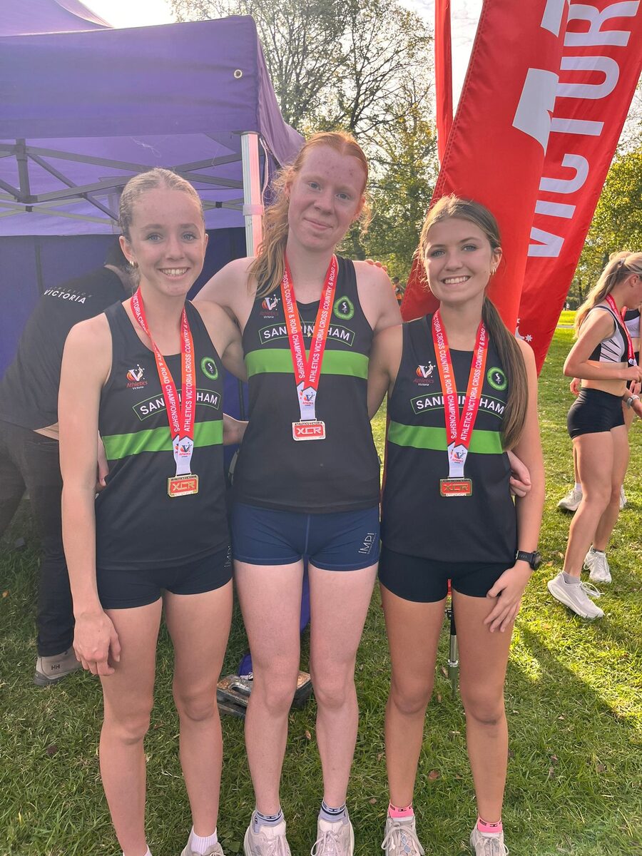 Sandringham women's Premier relay team with their gold medals at Jells Park.