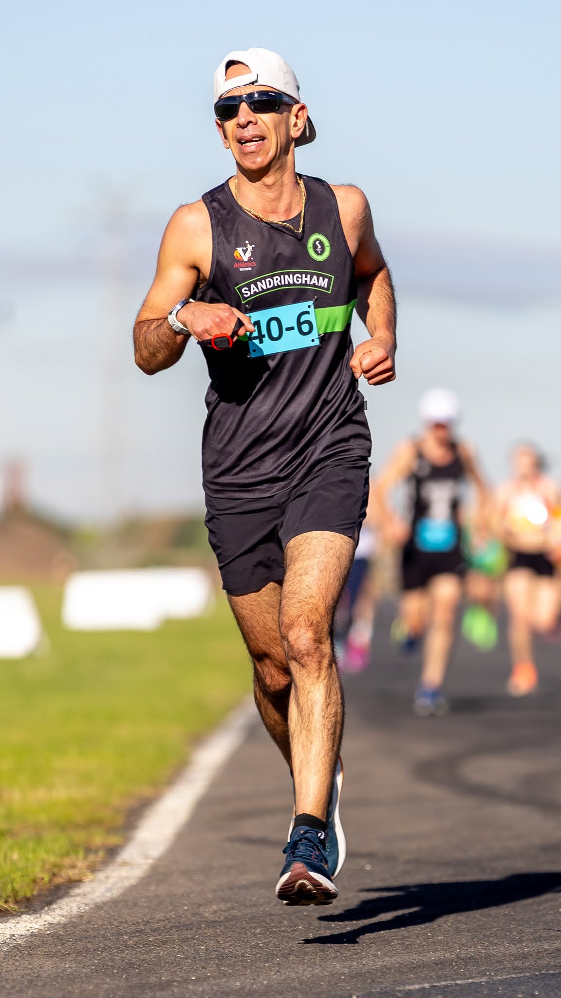 Sandy masters runner in the road relay at Calder Raceway