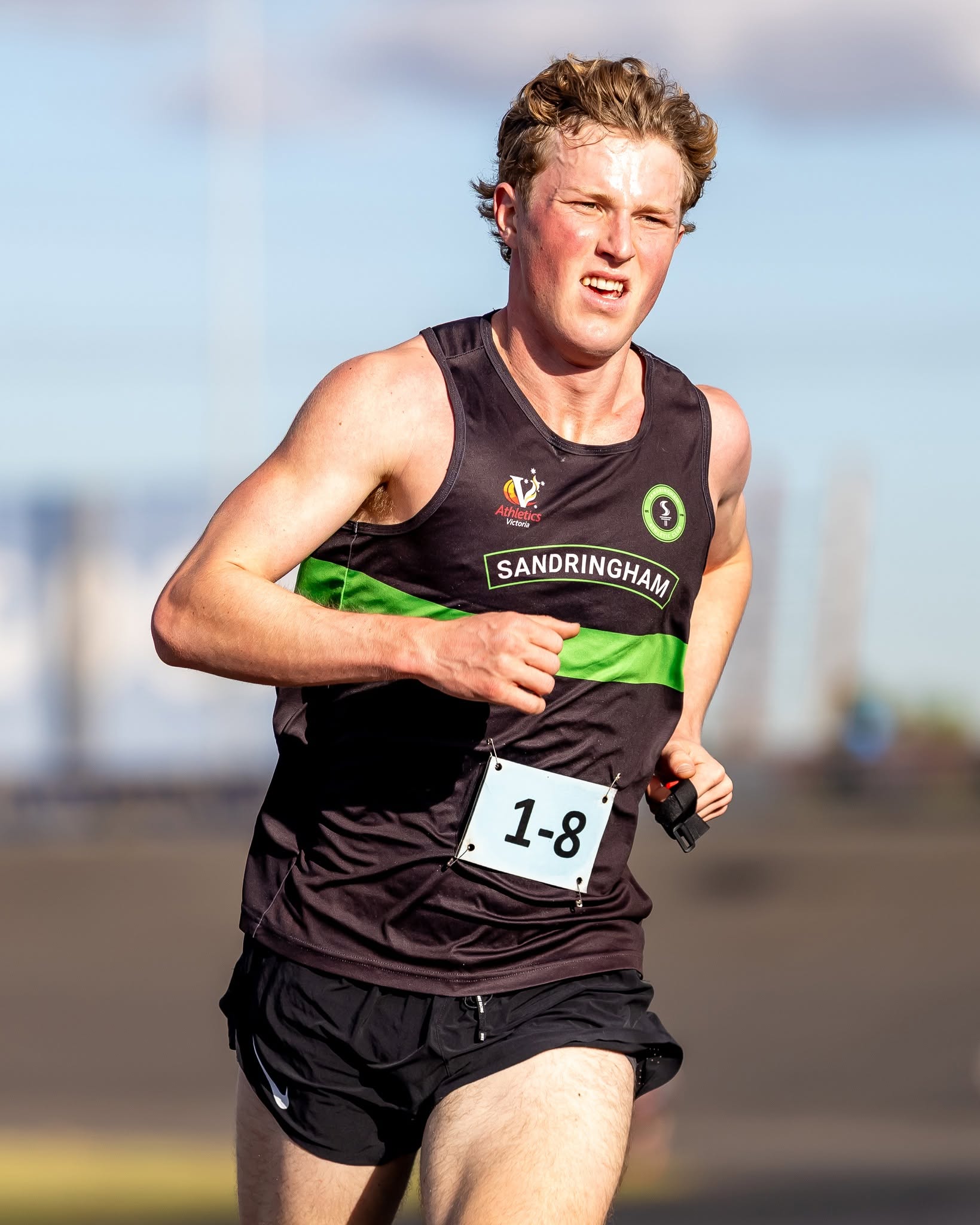 Young Sandy runner on the road relay at Calder Raceway