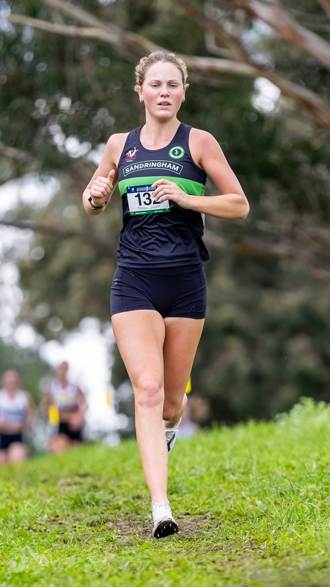 Sandy runner racing cross country at Bundoora