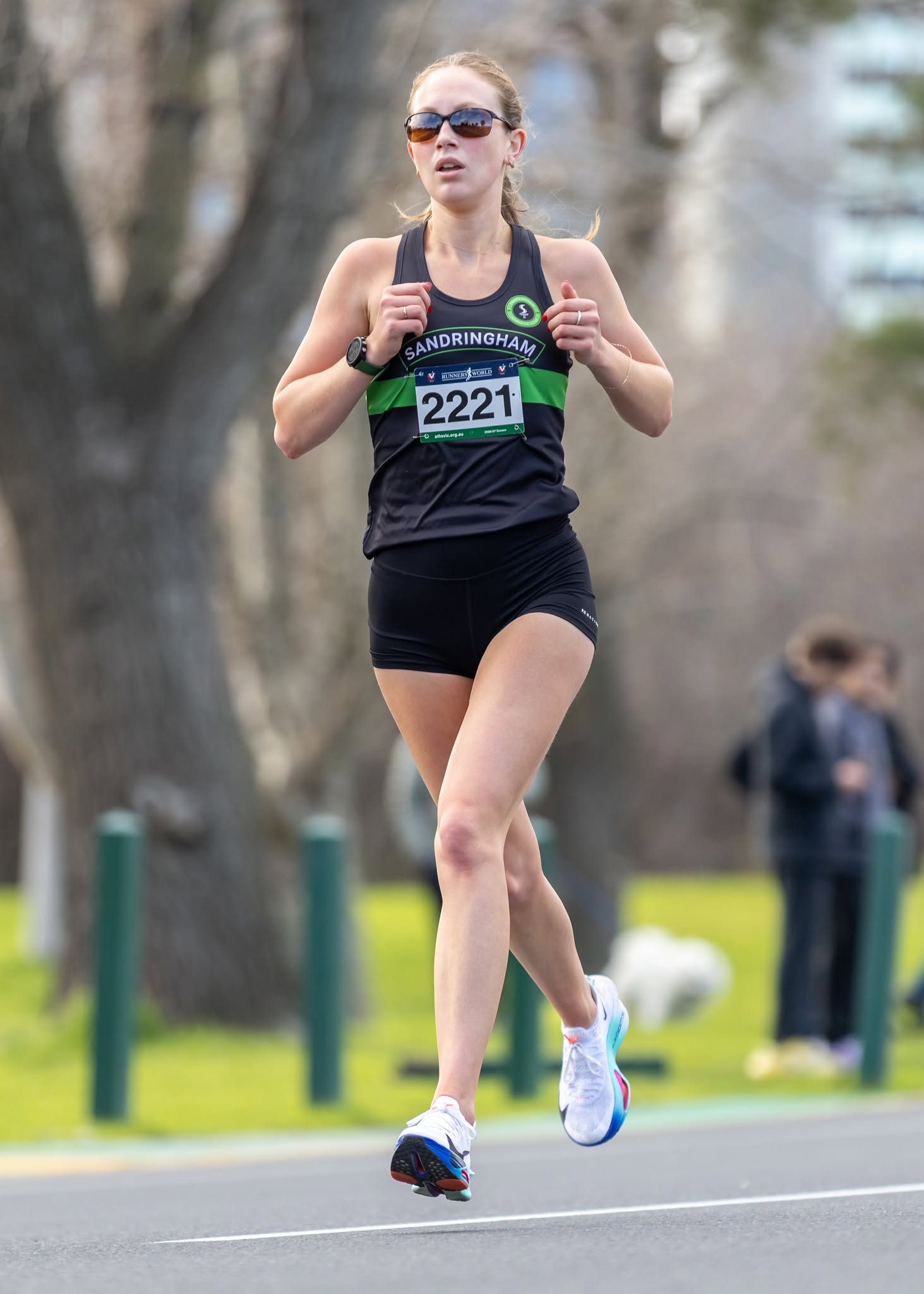 Sandy runner striding out in the Female Open 10km at Lakeside